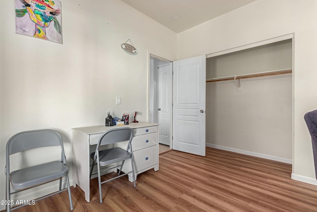 home office featuring hardwood / wood-style floors