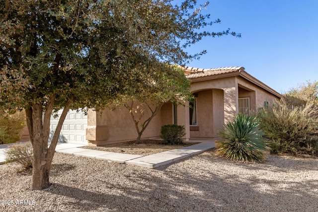 view of front of home featuring a garage