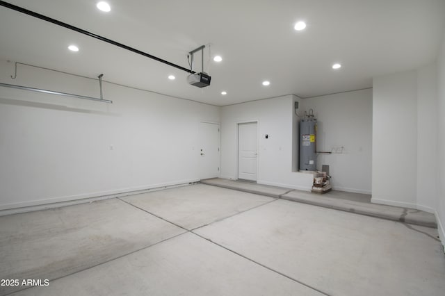 garage with a garage door opener and water heater