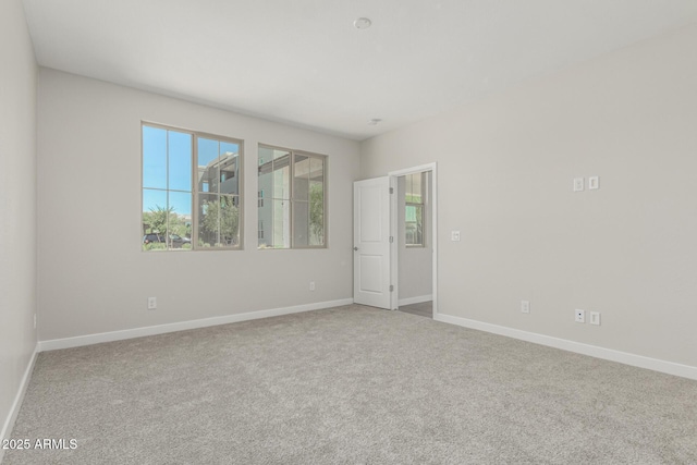 9416 E Sequence Ave, Mesa, AZ 85212 - unfurnished room featuring carpet and healthy amount of natural light