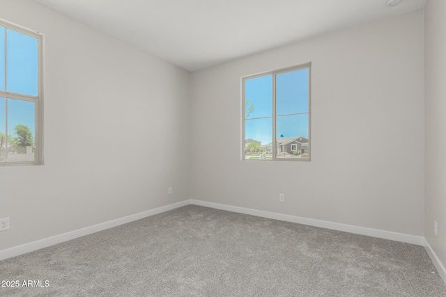 9416 E Sequence Ave, Mesa, AZ 85212 - carpeted spare room with baseboards