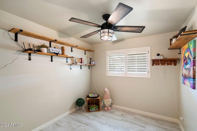 washroom with ceiling fan