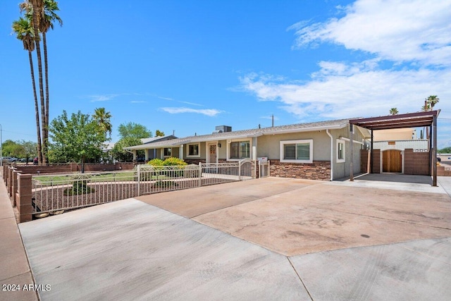 single story home with a carport