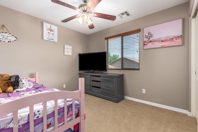 bedroom featuring visible vents, light colored carpet, baseboards, and ceiling fan