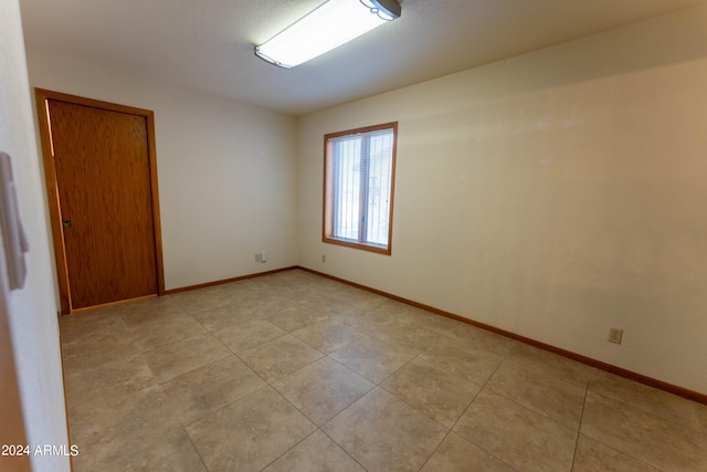 view of tiled empty room