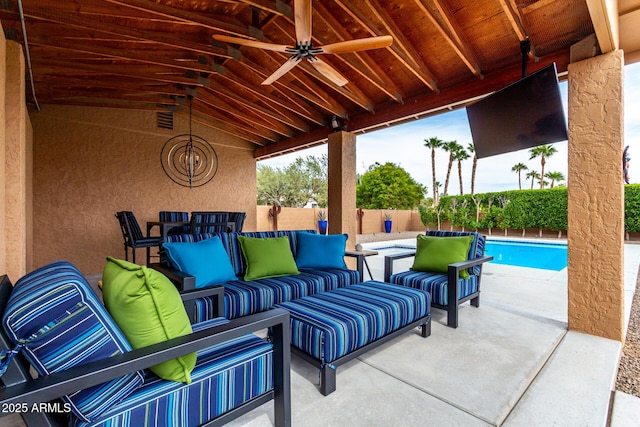 view of patio / terrace with ceiling fan, a fenced in pool, an outdoor living space, and a fenced backyard