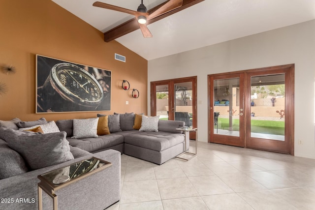 living area with light tile patterned flooring, visible vents, a ceiling fan, french doors, and beamed ceiling