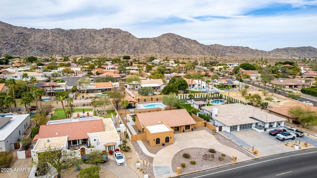 bird's eye view with a residential view and a mountain view