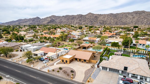 bird's eye view with a residential view and a mountain view