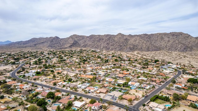 birds eye view of property with a residential view and a mountain view