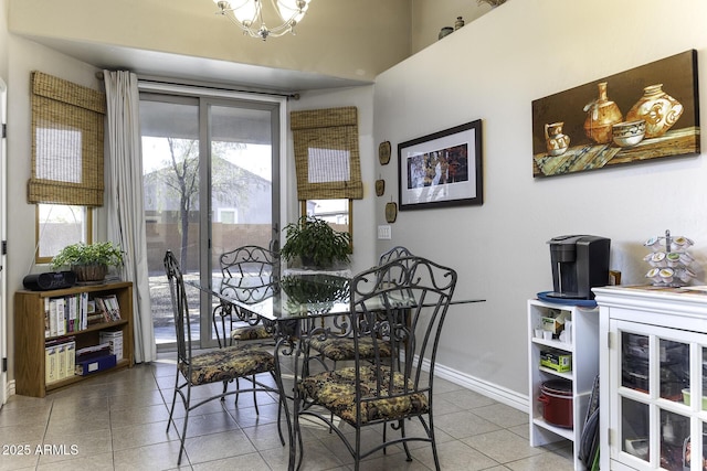 dining space with tile patterned flooring