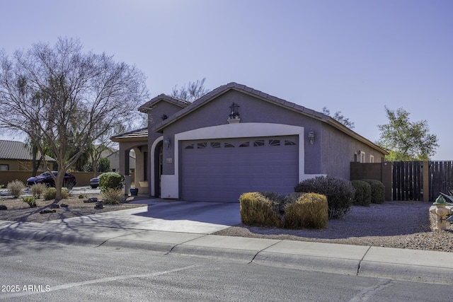 view of front of property with a garage