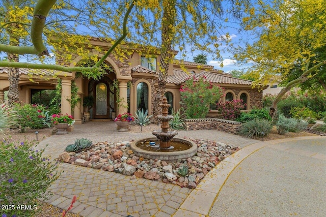 11821 S Tuzigoot Ct, Phoenix, AZ 85044 - mediterranean / spanish house with stucco siding and a tile roof