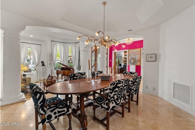 11821 S Tuzigoot Ct, Phoenix, AZ 85044 - dining area featuring ornate columns, light tile patterned floors, and visible vents
