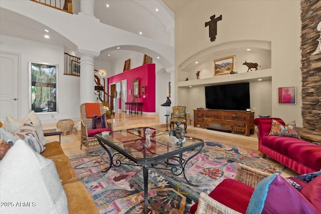11821 S Tuzigoot Ct, Phoenix, AZ 85044 - living room with recessed lighting, built in shelves, a towering ceiling, and ornate columns