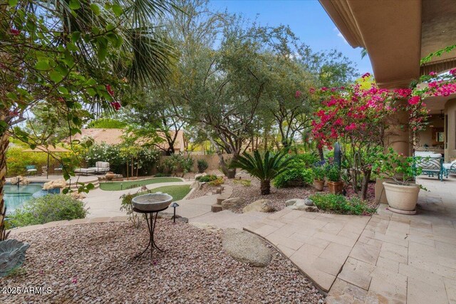 11821 S Tuzigoot Ct, Phoenix, AZ 85044 - view of property's community with a swimming pool and a patio