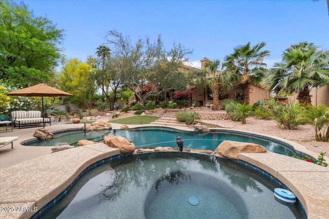 11821 S Tuzigoot Ct, Phoenix, AZ 85044 - view of swimming pool with a patio area and a pool with connected hot tub