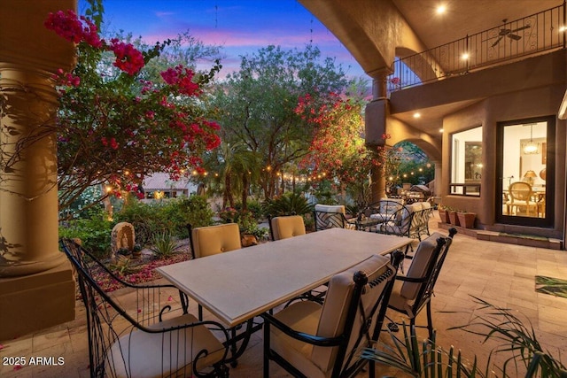 11821 S Tuzigoot Ct, Phoenix, AZ 85044 - patio terrace at dusk featuring outdoor dining area and a balcony