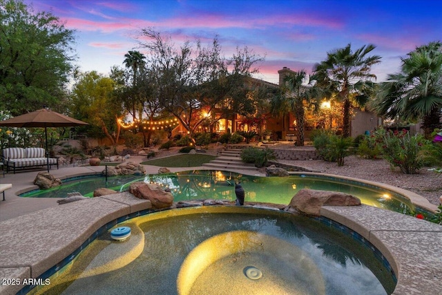 11821 S Tuzigoot Ct, Phoenix, AZ 85044 - view of pool with a patio area and a pool with connected hot tub