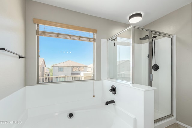3910 W Goldmine Mountain Dr, San Tan Valley, AZ 85144 - bathroom featuring a shower stall and a garden tub