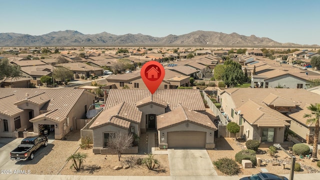 bird's eye view featuring a residential view and a mountain view