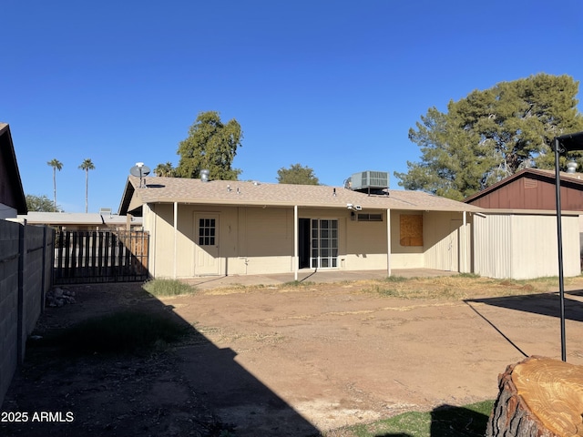 back of property featuring a patio area and central air condition unit