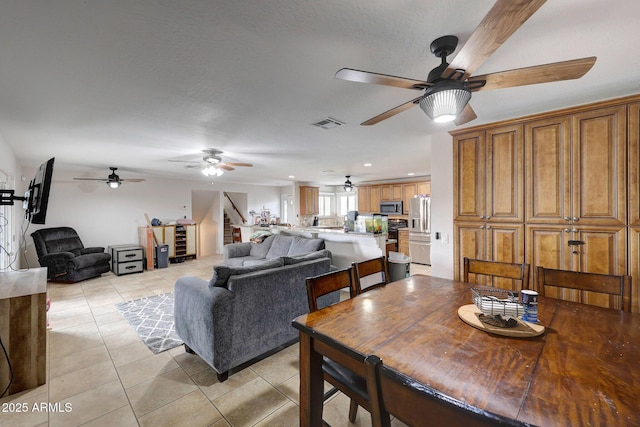 dining area featuring stairs, recessed lighting, visible vents, and light tile patterned floors