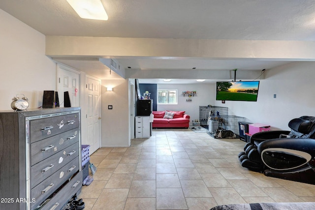 living area featuring light tile patterned floors