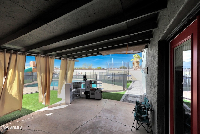 view of patio featuring a fenced backyard and a fenced in pool