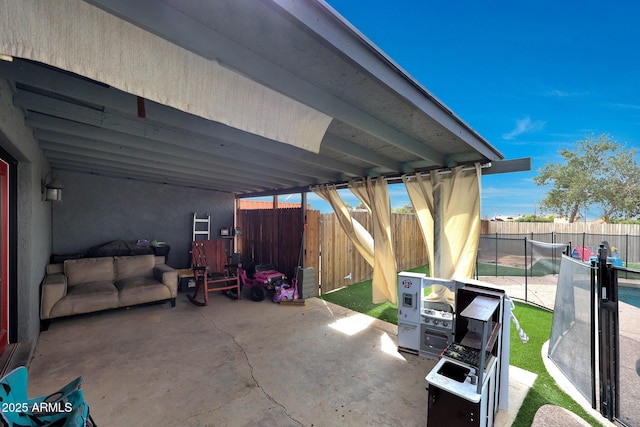 view of patio / terrace featuring a fenced backyard