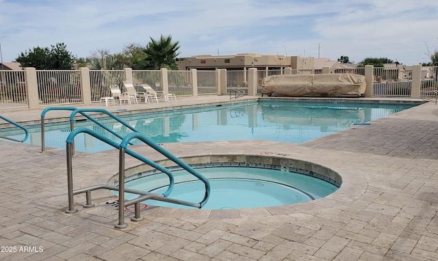 2101 S Meridian Rd Unit 437, Apache Junction, AZ 85120 - community pool with a hot tub and a patio
