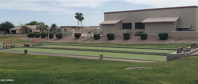 2101 S Meridian Rd Unit 437, Apache Junction, AZ 85120 - view of property's community featuring a bocce ball area and a yard