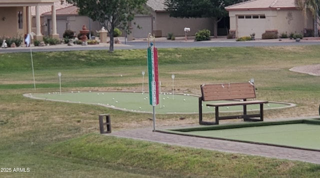 2101 S Meridian Rd Unit 437, Apache Junction, AZ 85120 - surrounding community featuring an area to practice putting and a lawn