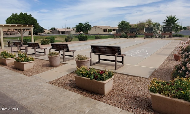 2101 S Meridian Rd Unit 437, Apache Junction, AZ 85120 - view of community featuring shuffleboard and a residential view