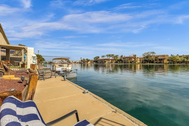 view of dock with a water view