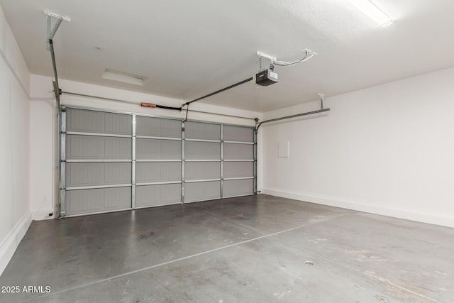 3555 E Erie St, Gilbert, AZ 85295 - garage with baseboards and a garage door opener