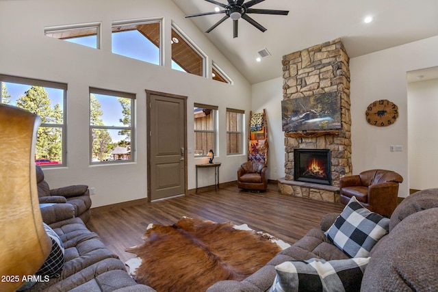 2380 W Narrow Leaf Ln, Show Low, AZ 85901 - living area with ceiling fan, wood finished floors, plenty of natural light, a fireplace, and high vaulted ceiling