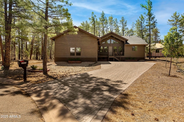 2380 W Narrow Leaf Ln, Show Low, AZ 85901 - rustic home featuring decorative driveway