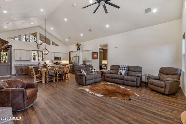 2380 W Narrow Leaf Ln, Show Low, AZ 85901 - living area with high vaulted ceiling, ceiling fan, and dark wood finished floors