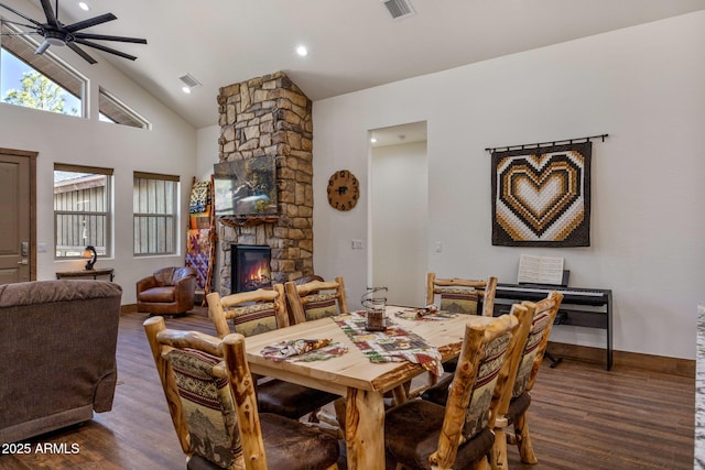 2380 W Narrow Leaf Ln, Show Low, AZ 85901 - dining room featuring ceiling fan, wood finished floors, a fireplace, and high vaulted ceiling