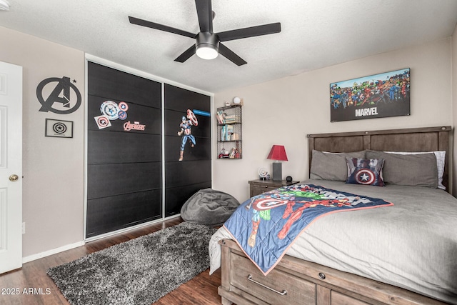 5110 E Mark Ln, Cave Creek, AZ 85331 - bedroom with wood finished floors, a ceiling fan, and baseboards