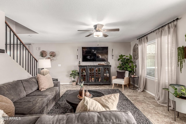 5110 E Mark Ln, Cave Creek, AZ 85331 - living area featuring ceiling fan, baseboards, and stairway