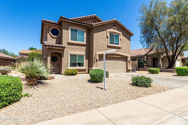 5110 E Mark Ln, Cave Creek, AZ 85331 - mediterranean / spanish house with concrete driveway, a tiled roof, stucco siding, and a garage