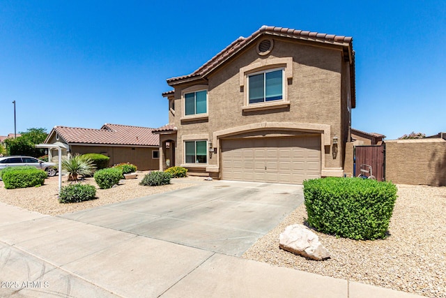 5110 E Mark Ln, Cave Creek, AZ 85331 - view of front of house featuring a garage, stucco siding, concrete driveway, and a tile roof