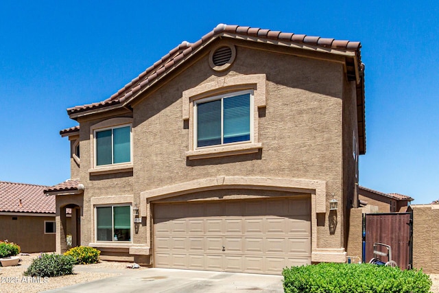 5110 E Mark Ln, Cave Creek, AZ 85331 - view of front of property featuring a tile roof, stucco siding, and a garage