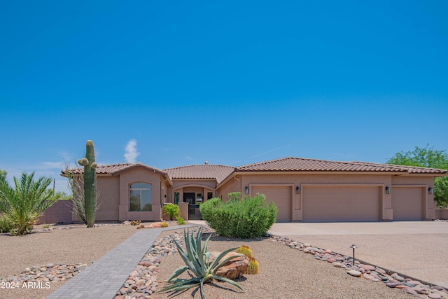 view of front of property with a garage