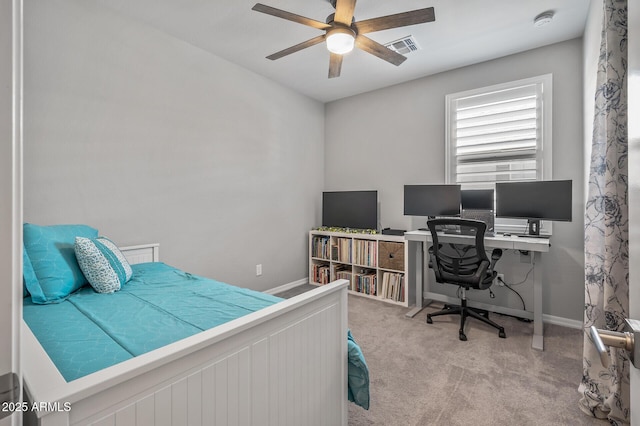 carpeted bedroom with baseboards, visible vents, and ceiling fan