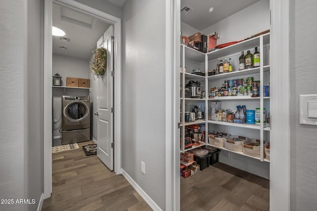pantry featuring washer / dryer and visible vents