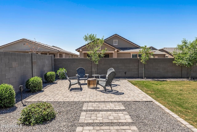 view of patio with a fire pit and a fenced backyard