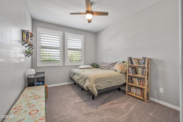 bedroom featuring ceiling fan, carpet floors, and baseboards